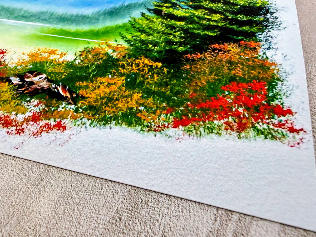 Colorful landscape painting with trees and flowers on a textured surface