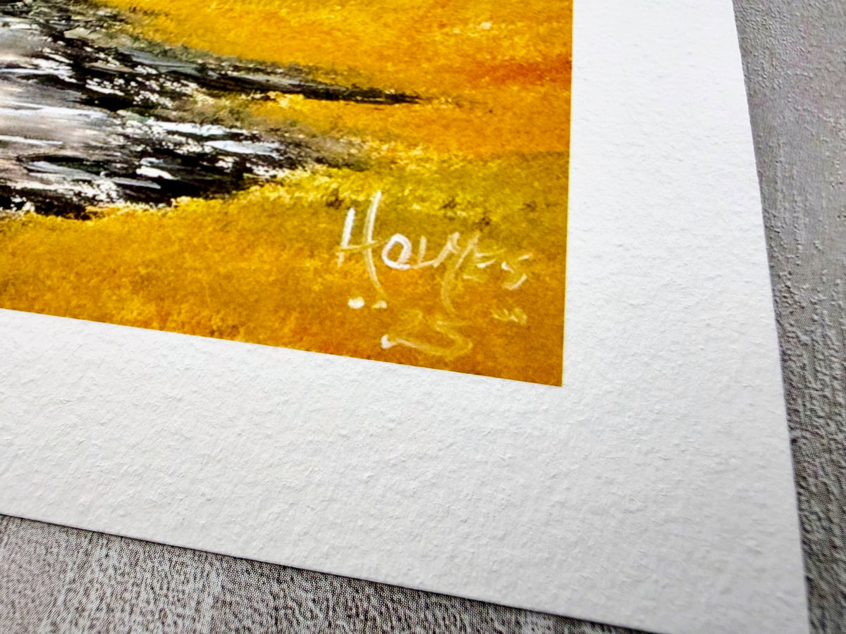 print detail with yellow, black, and white on a textured surface