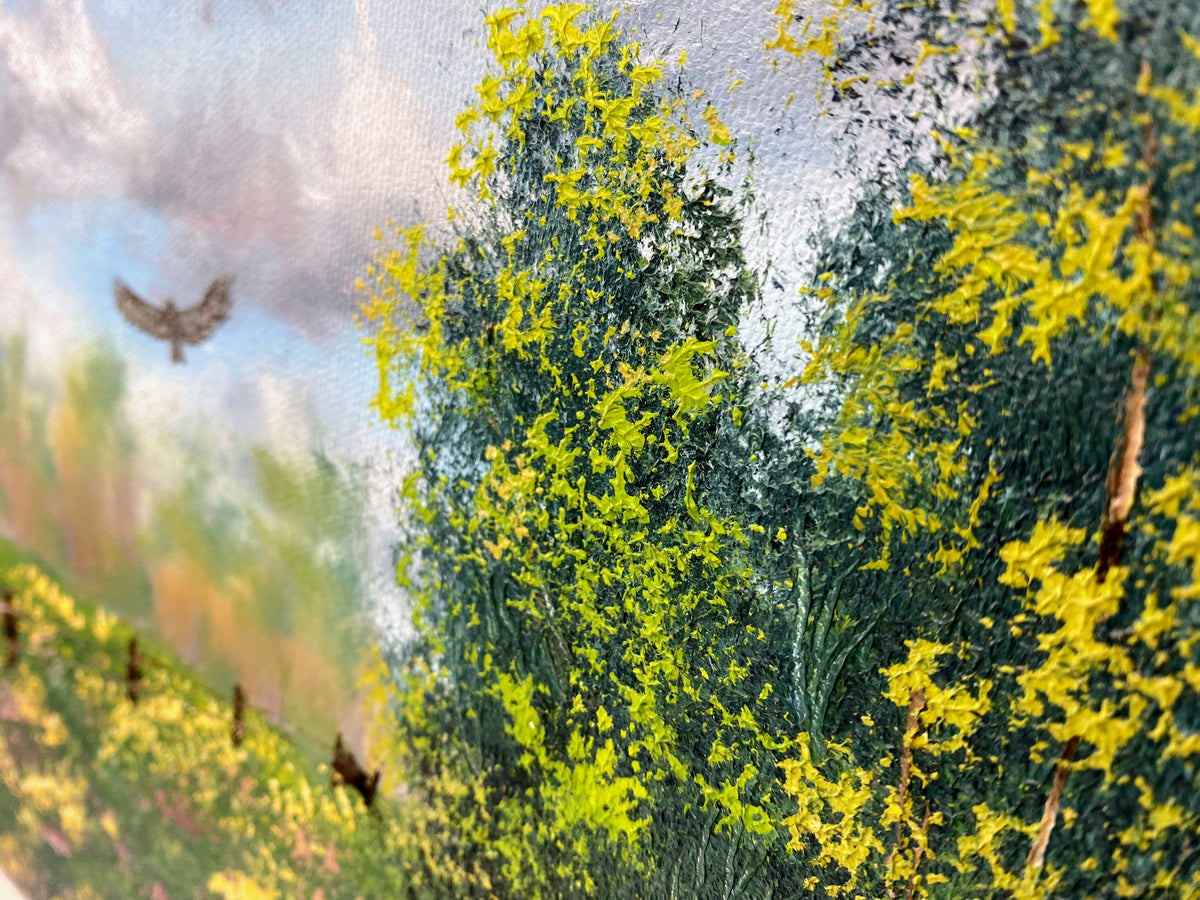 Close-up of a tree with yellow flowers and a blurred background