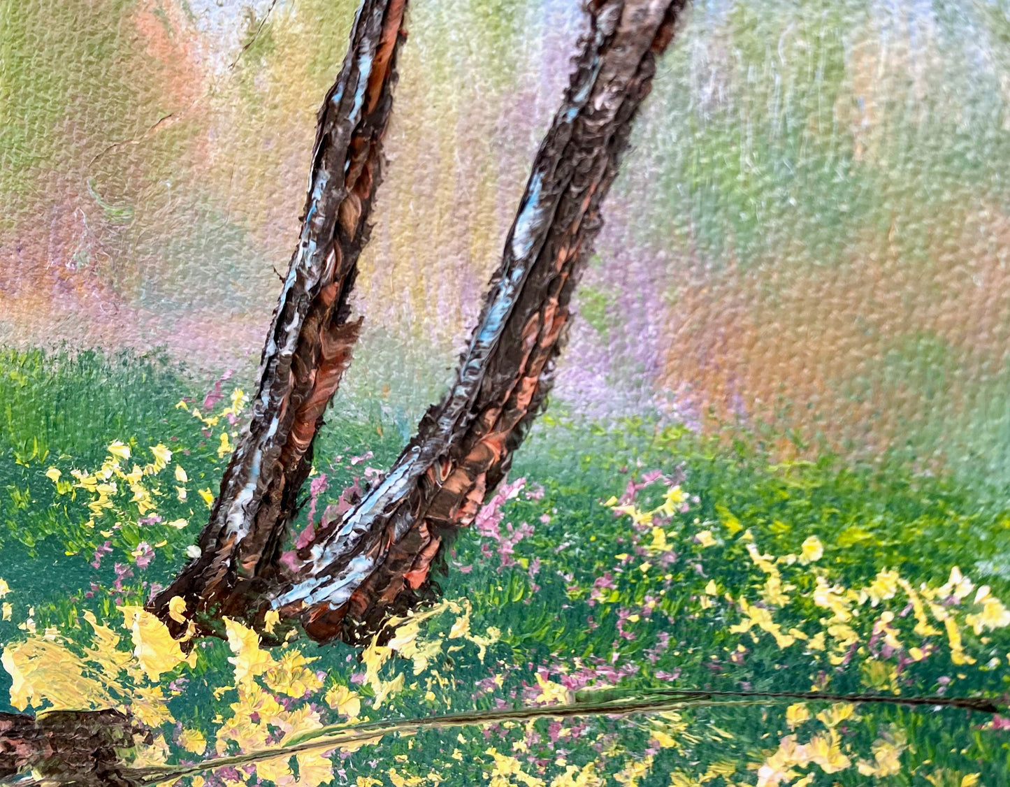 Close-up of a tree trunk with a colorful, abstract background
